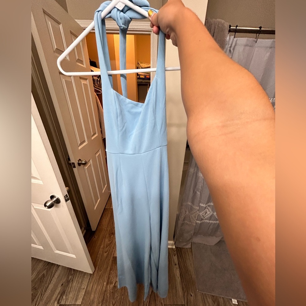 Blue jumpsuit purchased from These Three Boutique. Worn once
